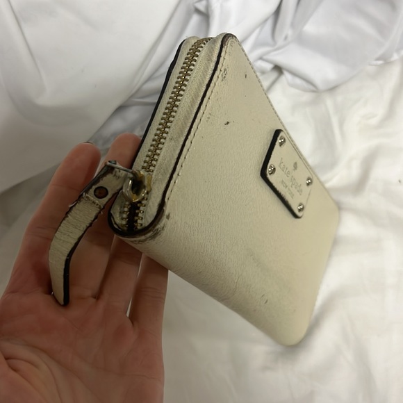 Beige Kate spade large zip around wallet. All damage is shown in pictures. - Picture 3 of 6